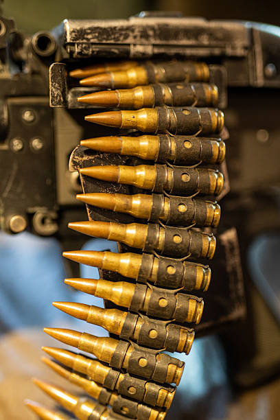 istock Machine gun bullets in cartridge 2215290364