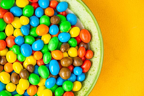 istock Vibrant candy-coated chocolates in a bowl. 2215294642
