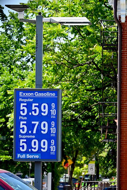 Washington, D.C., USA - May 10, 2025: A marquee at an Exxon service station on Capitol Hill near the U.S. Capitol shows the prices of gasoline.