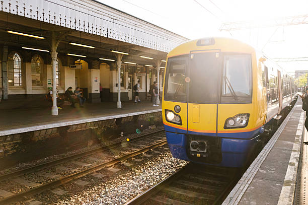 A city train arriving at a station platform