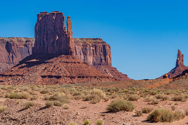 istock Left Mitten and Hands praying Rock Formation Within Monument Valley Arizona 2215299829