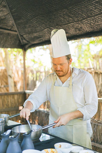 istock Chef prepares food at luxury resort 2215308631