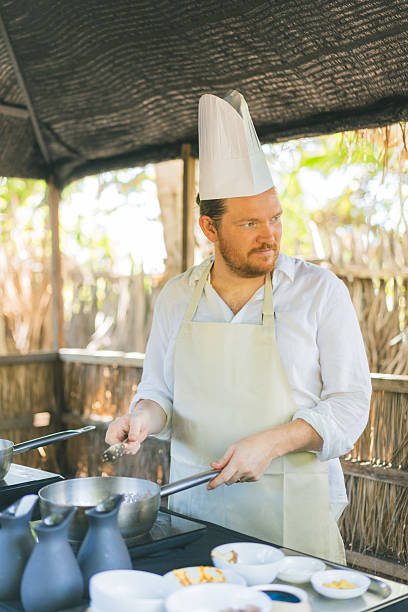 istock Chef prepares food at luxury resort 2215308634