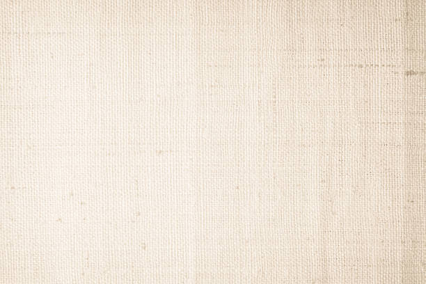 istock Brown sackcloth woven texture background in natural pattern. Jute hessian burlap, linen background in light beige cream color blank. Weaving canvas fiber line cotton cloth textured as organic. 2215311729