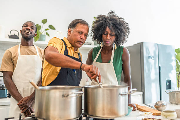 istock Learning Indian Cuisine: Diverse Adults at a Cooking Workshop 2215312833