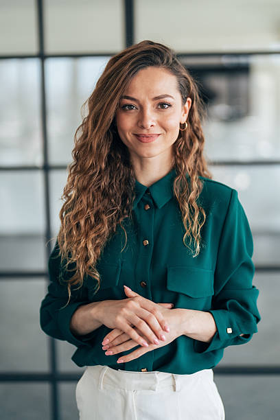 istock Confident Businesswoman in a Bright Office Setting 2215321329