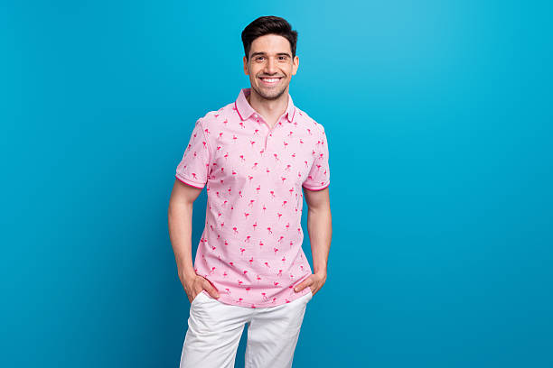 istock Portrait of satisfied glad young man put hands pockets posing empty space isolated on blue color background 2215325006