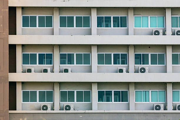 istock Urban Apartment Building with Windows 2215326074