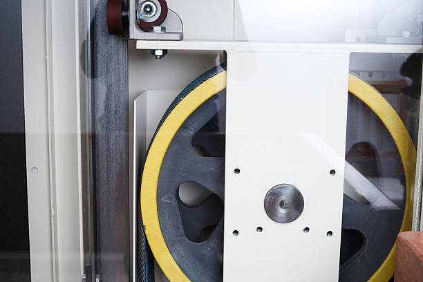 istock Elevator pulley in glass lift or elevator of building. 2215327619
