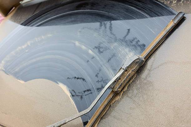 istock Vehicle rear window covered in dust 2215330383