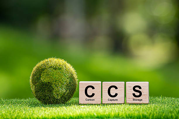 istock Symbol CCS  for Carbon Capture Storage words CCS on a wood cube on the environmental background. Net zero action concept. green energy, reduce carbon footprint, Save energy, carbon dioxide. 2215332592