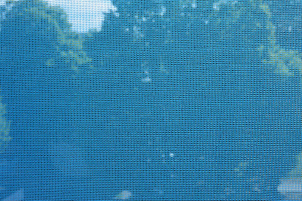 istock Scaffolding netting or scaffold mesh on building facade scaffolding. 2215335543