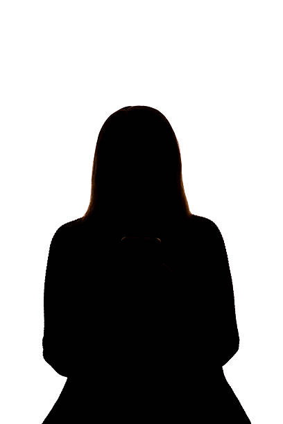 istock Silhouette of young woman using smartphone on white background 2215349571