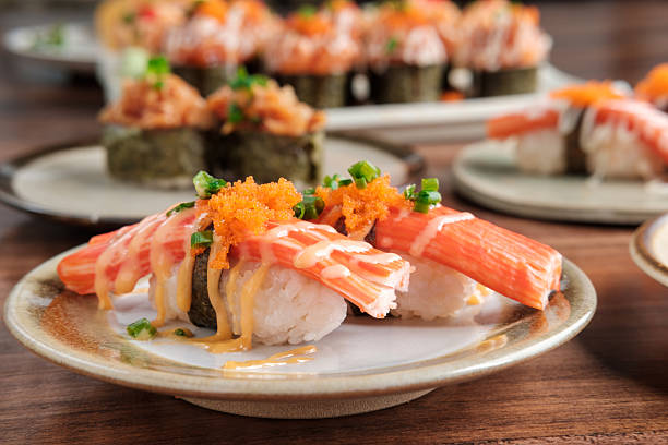 Crab Stick Sushi with Mayonnaise and Tobiko with copy space.