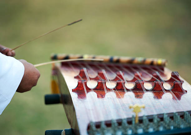 istock Yangchen, Bhutanese hammered dulcimer string instrument, Paro, Bhutan 2215352103