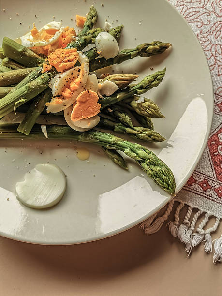 Homemade freshness char grilled asparagus with romesco sauce and garlic bread, chopped roasted almond