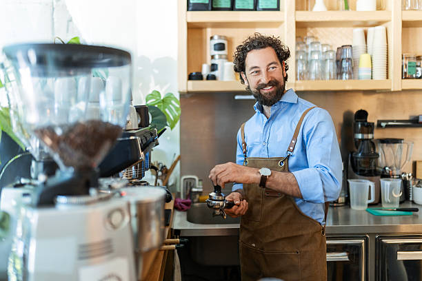istock Professional Barista Preparing for Morning Rush 2215366214