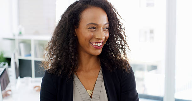 istock Business, smile and thinking with woman in office for ideas, problem solving or vision. Decision, future and planning with happy corporate employee in professional workplace for company development 2215366661
