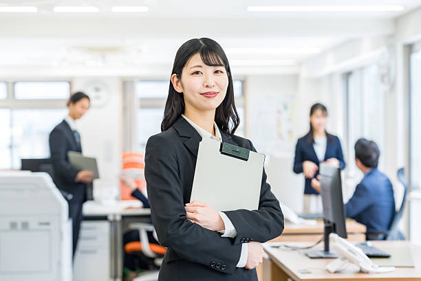 istock business woman working in the office 2215367689