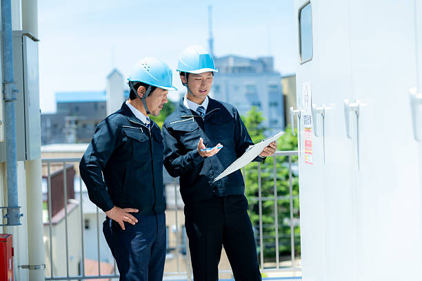 istock Businessmen in work clothes having a meeting 2215367832