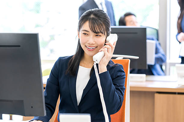istock business woman working in the office 2215367836