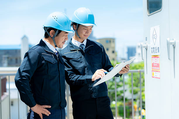 istock Businessmen in work clothes having a meeting 2215367840