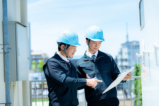 istock Businessmen in work clothes having a meeting 2215367846