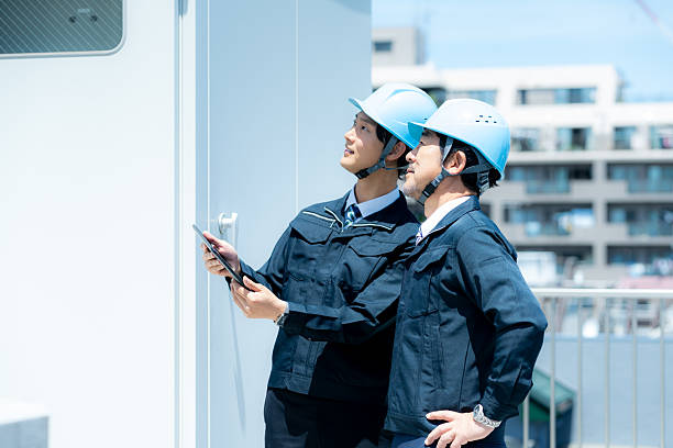 istock Businessmen in work clothes having a meeting 2215367880
