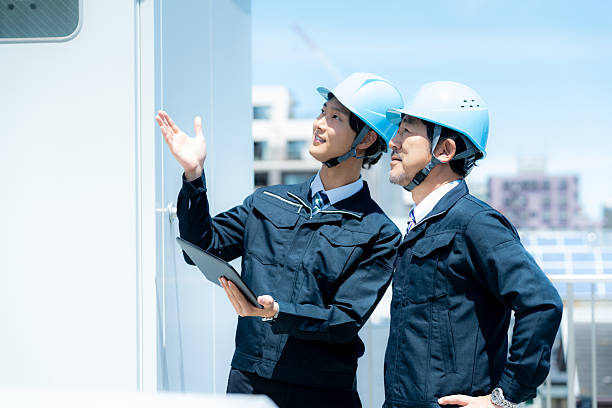 istock Businessmen in work clothes having a meeting 2215367908