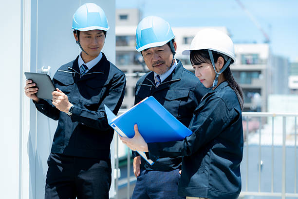istock Businessmen in work clothes having a meeting 2215367926
