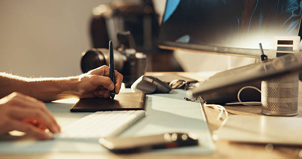istock Hands, man and graphic tablet for photography, drawing or editing image on computer keyboard. Creative art, studio and editor with pen closeup for design, retouching and post production in startup 2215367930