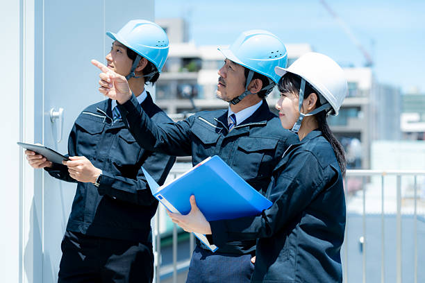 istock Businessmen in work clothes having a meeting 2215367934