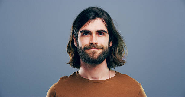 istock Writer, portrait and man in studio with positive mindset for creative, career growth and business. Confidence person, freelancer and professional with gray background, mockup space and entrepreneur 2215372343