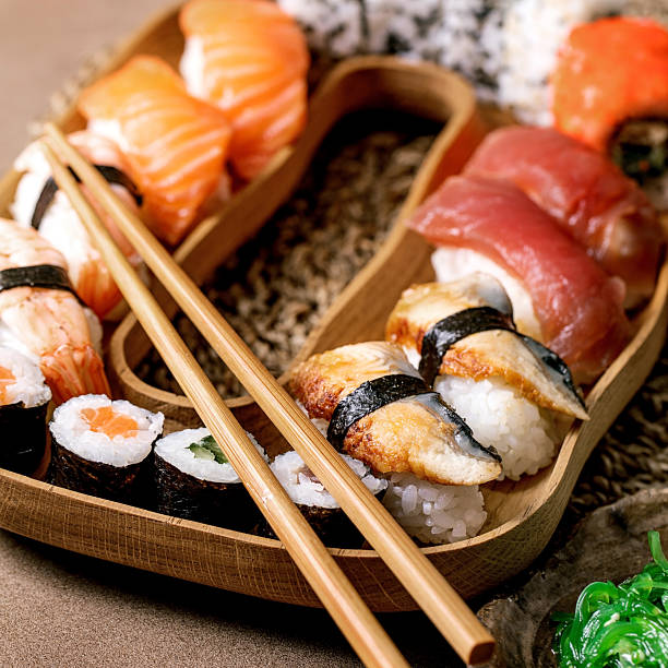 istock Japanese dish sushi and rolls rice with fish 2215374069