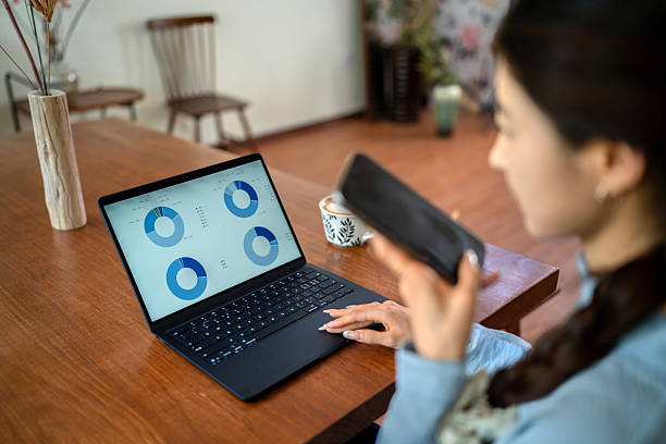 istock Asian young woman working at home 2215377983