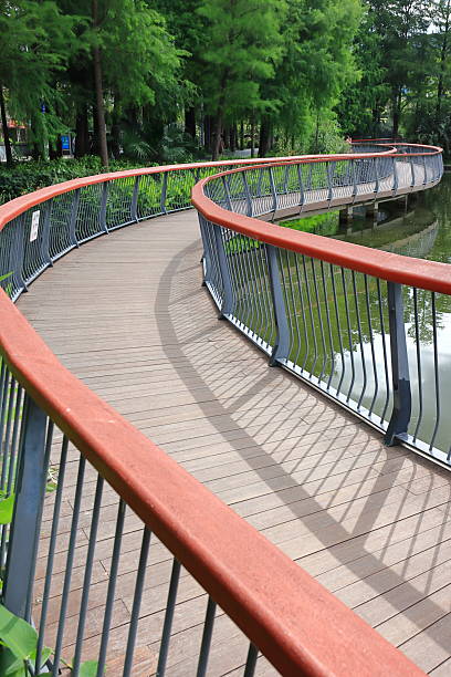 istock Wooden bridge in the park 2215379299