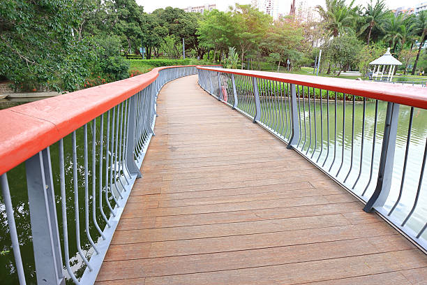 istock Wooden bridge in the park 2215379934