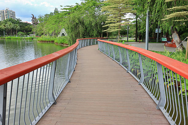 istock Wooden bridge in the park 2215380262