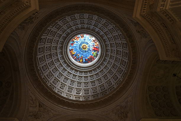 The Trinity in the stained glass of the Church of Santa Maria dell'Anima, in Rome, Italy.