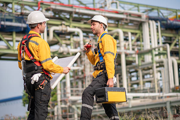 istock Surveyor engineers team wearing safety uniform checking inspection by  inspection and checking construction process railway switch and checking work on railroad site is industry transportation concept. 2215387498