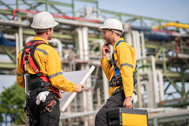 istock Surveyor engineers team wearing safety uniform checking inspection by  inspection and checking construction process railway switch and checking work on railroad site is industry transportation concept. 2215387509