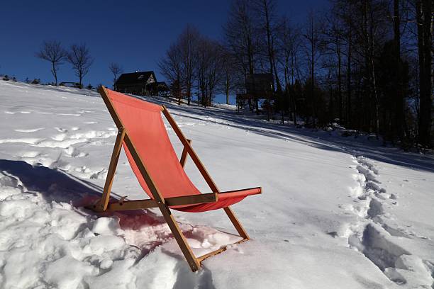 istock Sun chair on snow in Poland 2215394625