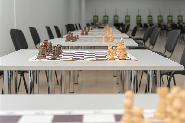 istock Chess boards with pieces placed before the game. Chess competition or tournament 2215403428