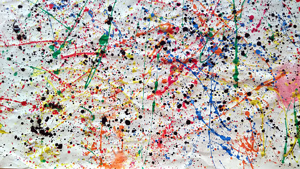 istock Large abstract splatter painting with multicolored paint drips and black ink spots on crumpled white canvas 2215406746