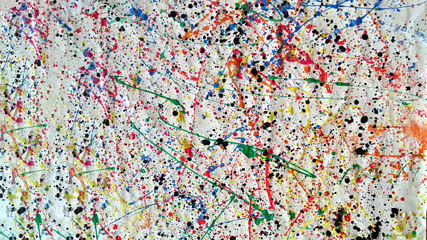 istock Large abstract splatter painting with multicolored paint drips and black ink spots on crumpled white canvas 2215406757