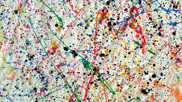 istock Large abstract splatter painting with multicolored paint drips and black ink spots on crumpled white canvas 2215406771