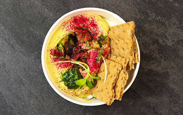 istock Hummus. A dish of crushed chickpeas for delivery, or online store. 2215409521