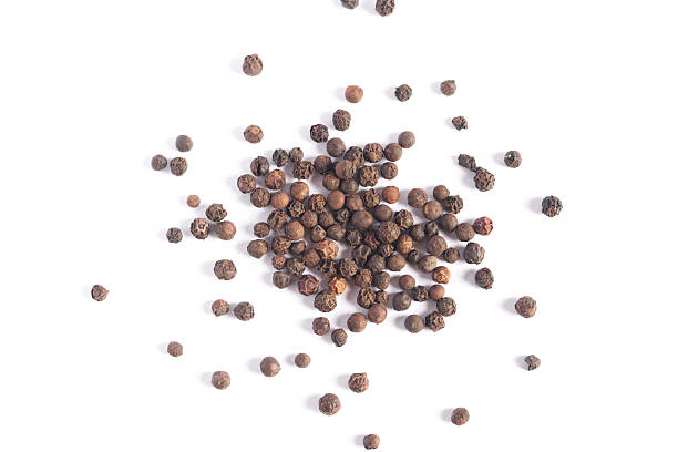 istock Heap of black pepper peas isolated on white background. 2215409647