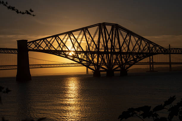 istock Queensferry Red Rail bridge at dusk 2215410053