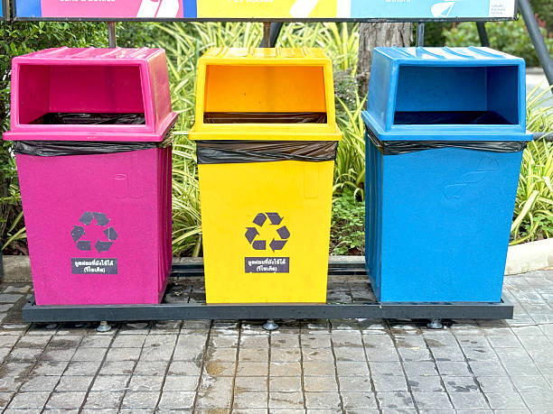 istock Separate your trash before throwing it away in the trash can to help reduce global warming. 2215410735